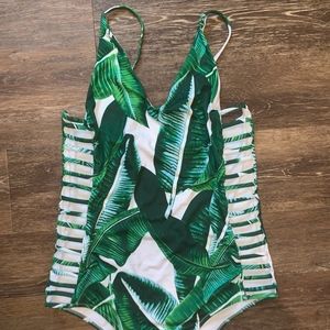 White and green floral one-piece swimsuit